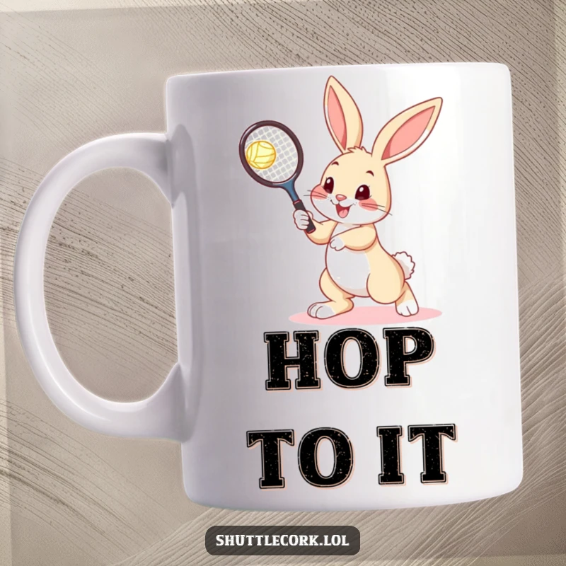 Funny bunny mug showing a cheerful bunny mid-hop, racquet ready to hit a shuttlecock in a tennis match.