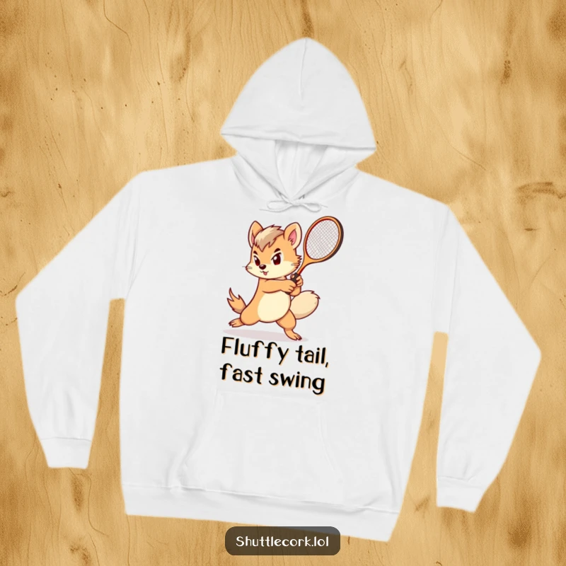 Funny hoodie: a determined creature with a fluffy tail swings a miniature racket with impressive speed and focus.