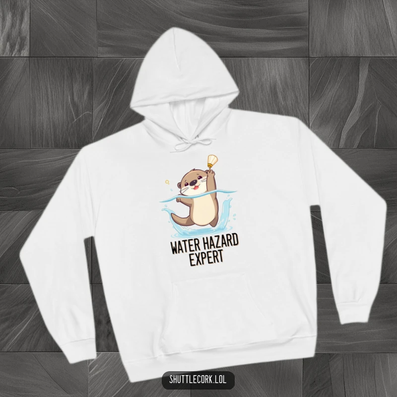 Funny hoodie graphic of a playful otter diving with a big splash to catch a shuttlecock, celebrating aquatic badminton skills.