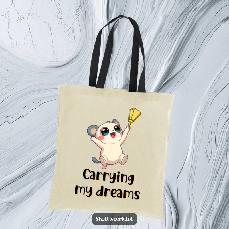 Funny tote bag: a creature with big, round eyes jumps high, reaching for a shuttlecock with hopeful determination.